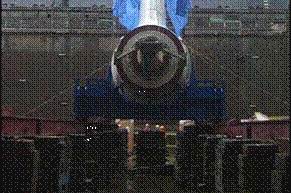 12 The spare Azipod is lifted over the dock door into the dry dock..jpg